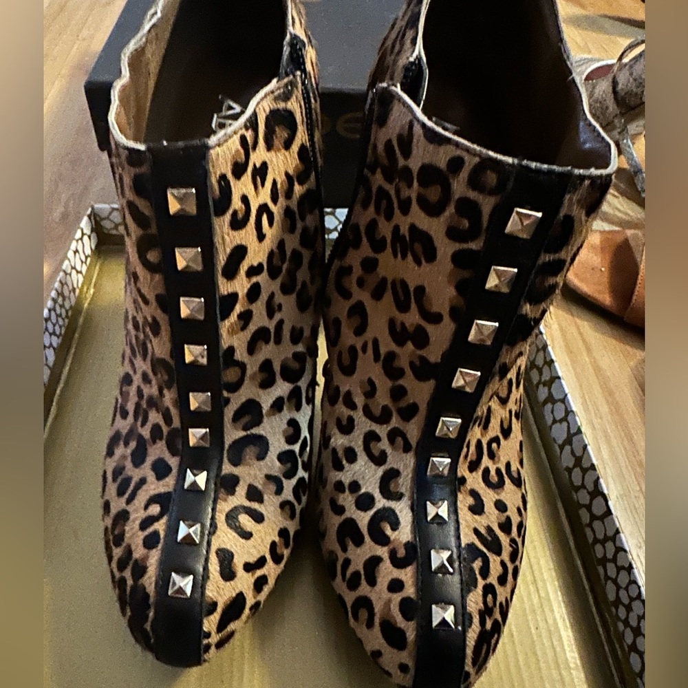 ABS animal print studded booties.